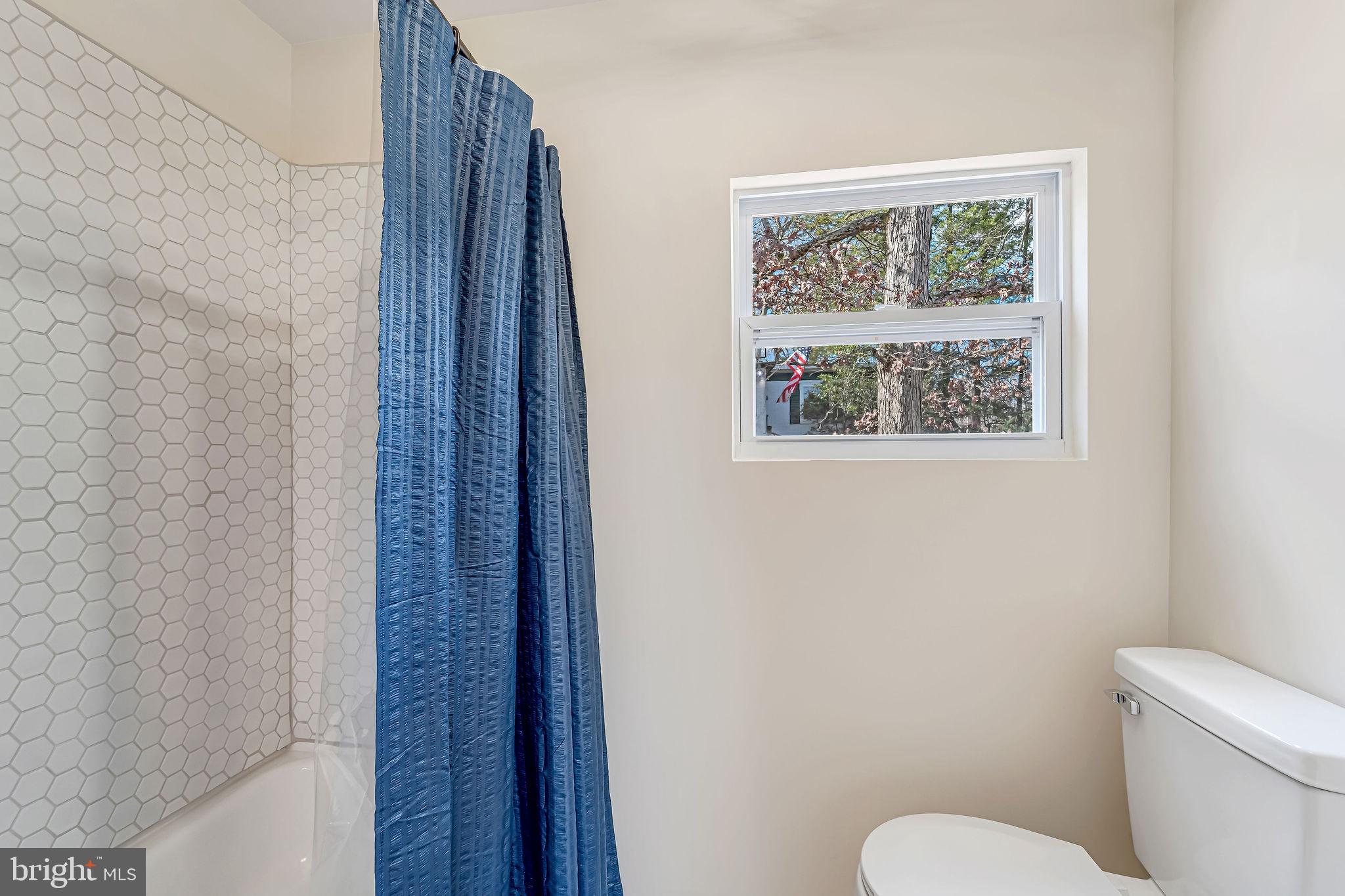 3620 Weymouth Road Browns Mills, NJ 08015 - Photo 26 of 27 a white toilet sitting next to a small bathroom