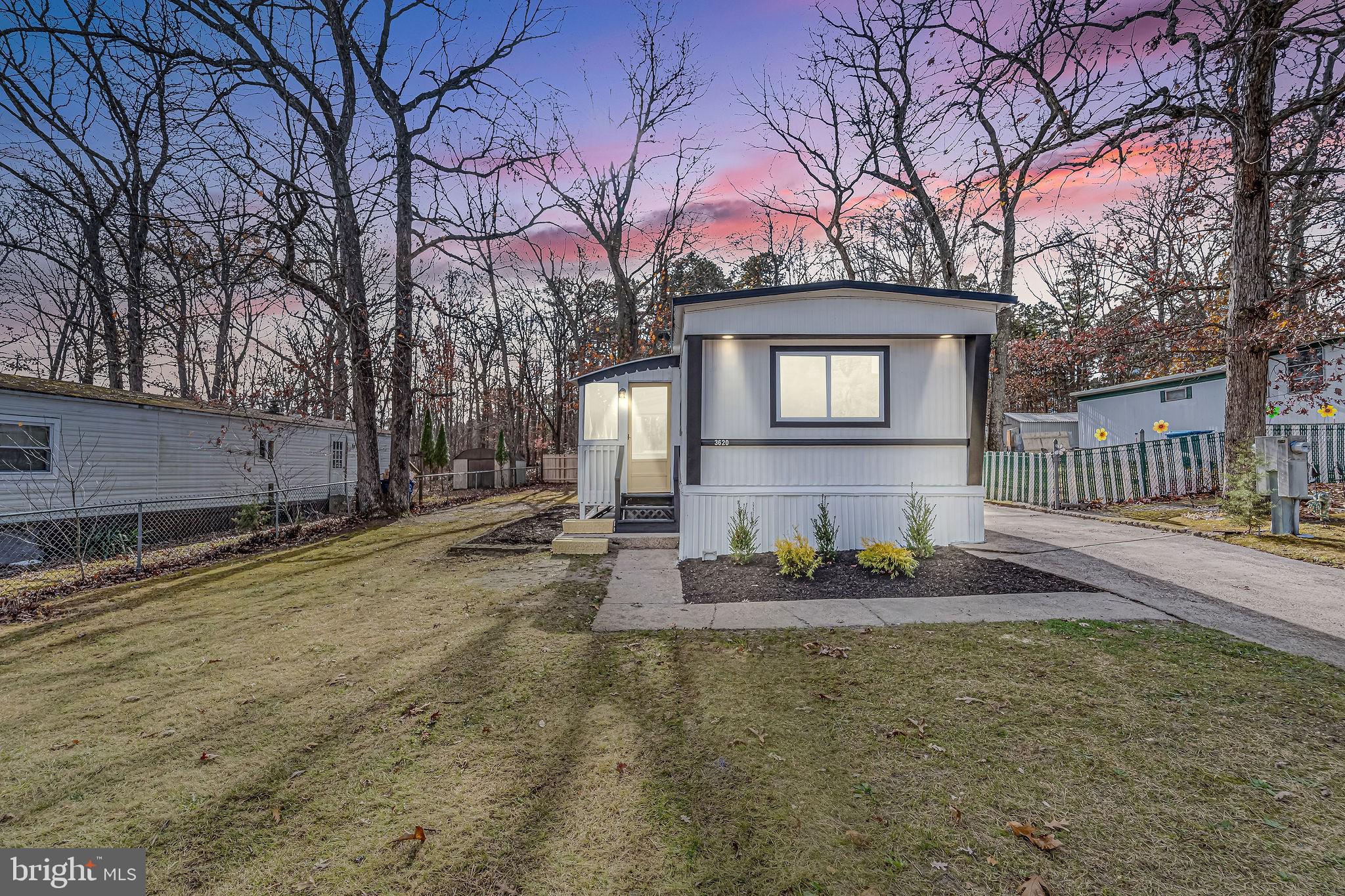 3620 Weymouth Road Browns Mills, NJ 08015 - Photo 3 of 27 a front view of a house with a yard and tree s