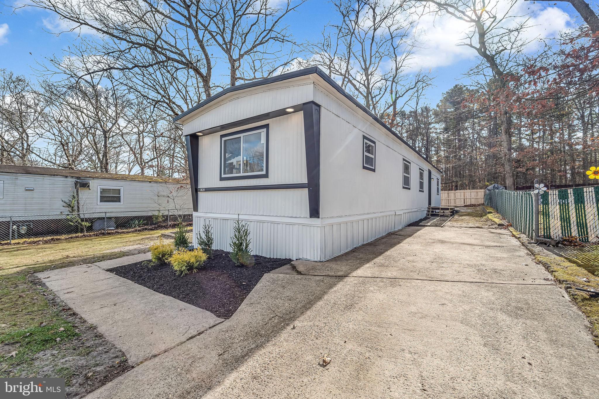3620 Weymouth Road Browns Mills, NJ 08015 - Photo 5 of 27 a view of a house with snow on the wall