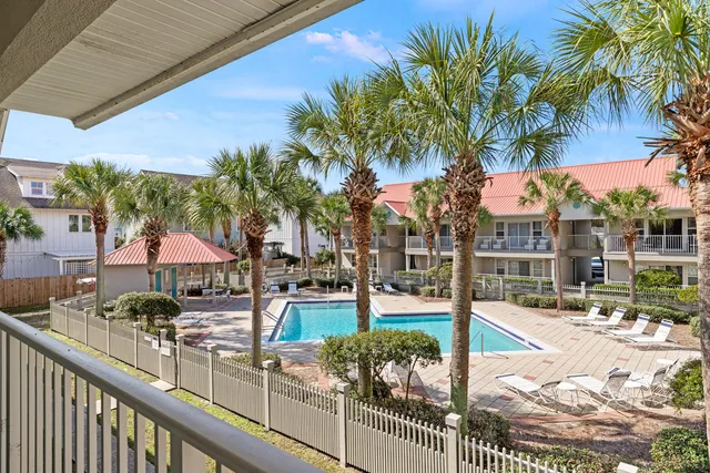 a view of a swimming pool with a patio