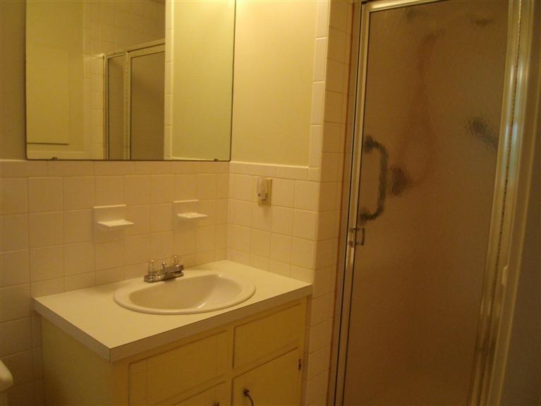 23 Ansel Howland Road Centerville, MA 02632 - Photo 24 of 27 a bathroom with a sink and a mirror