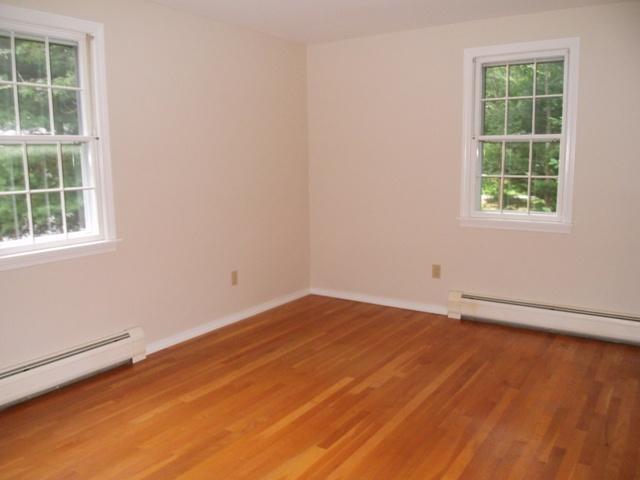 23 Ansel Howland Road Centerville, MA 02632 - Photo 25 of 27 an empty room with windows