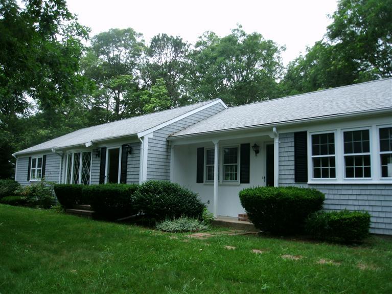 23 Ansel Howland Road Centerville, MA 02632 - Photo 4 of 27 a view of a house with sitting area and garden