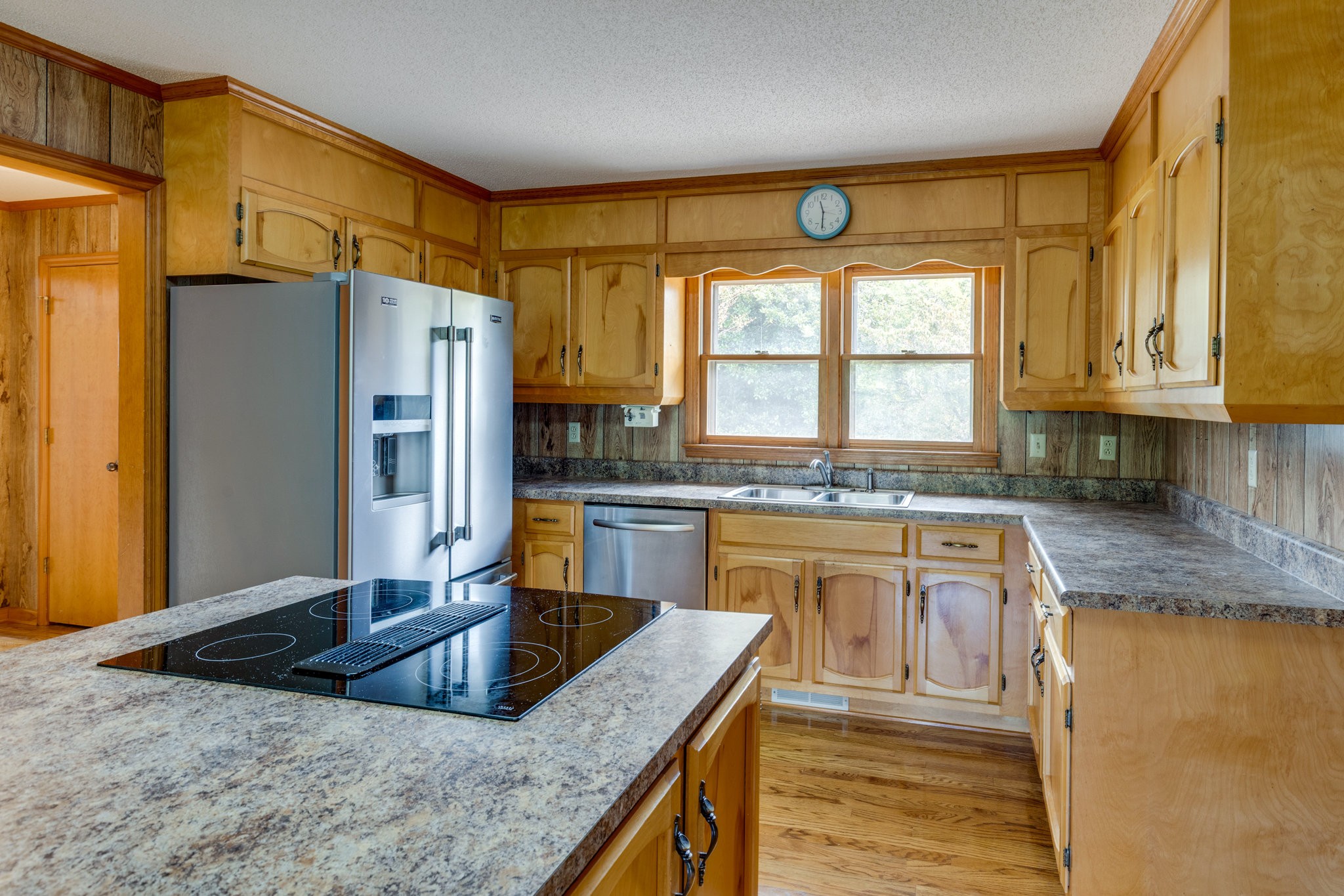 1340 Magazine Road Pulaski, TN 38478 - Photo 14 of 83 a kitchen with stainless steel appliances granite countertop a sink a stove and a refrigerator