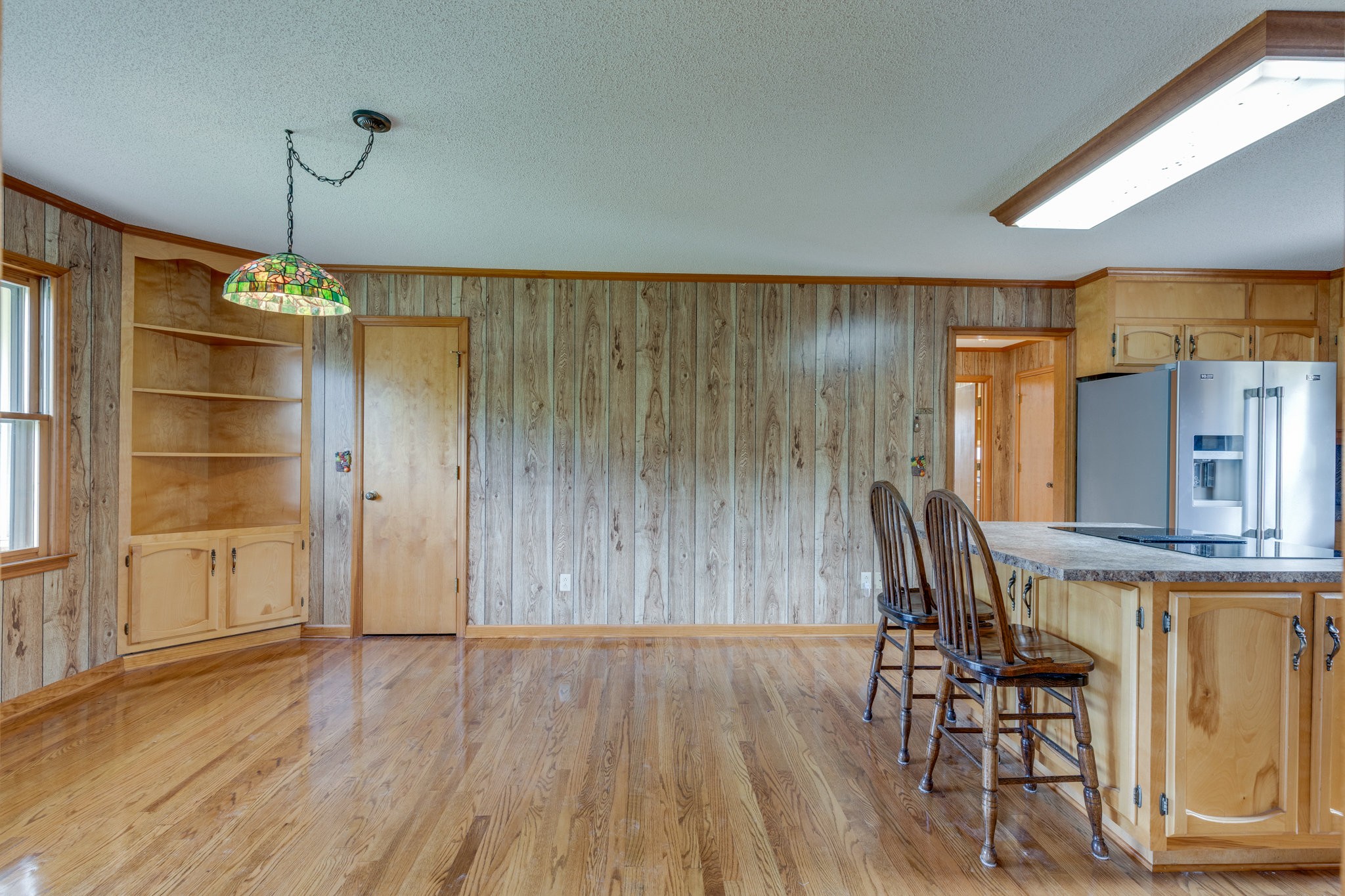 1340 Magazine Road Pulaski, TN 38478 - Photo 16 of 83 an empty room with wooden floor and windows