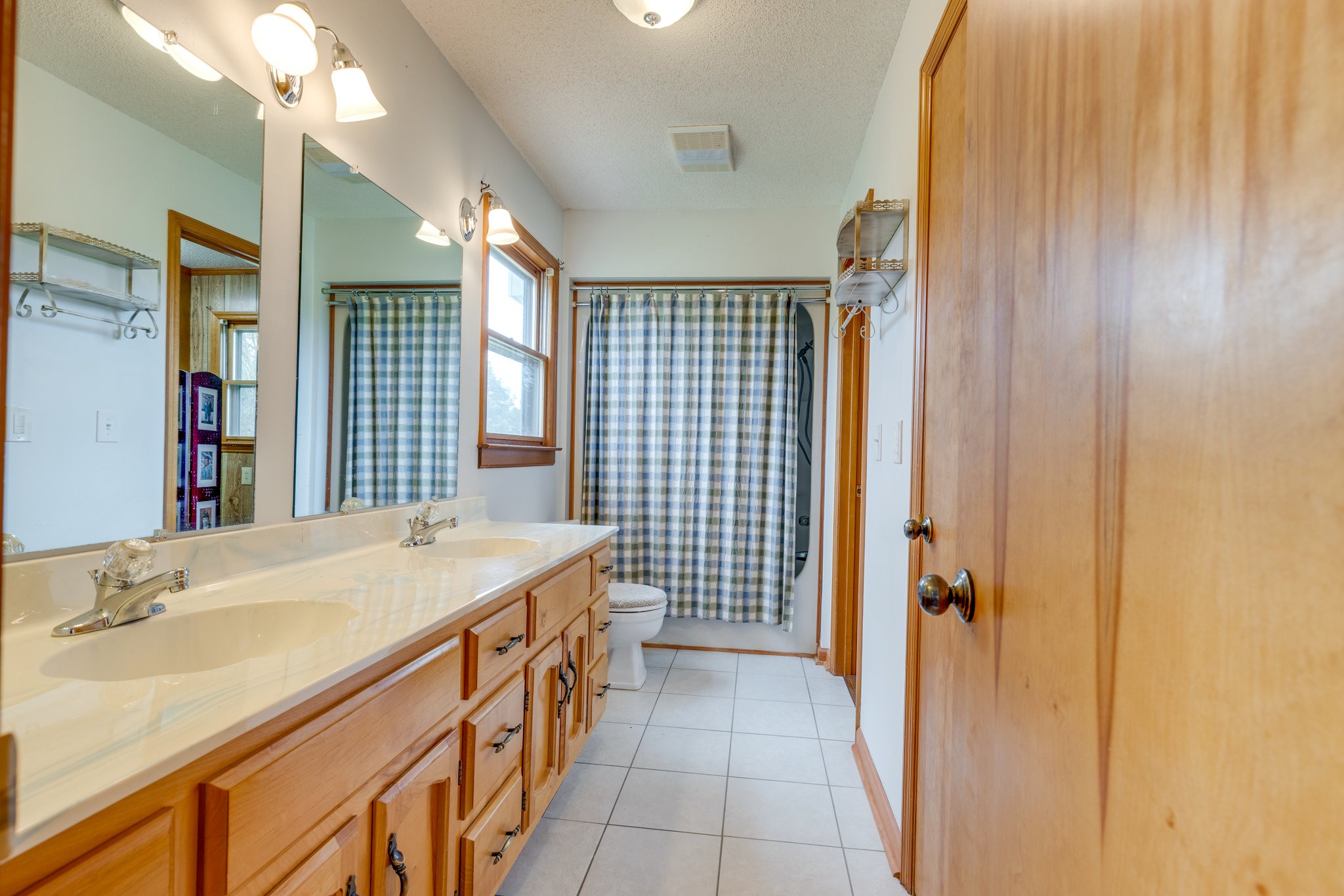 1340 Magazine Road Pulaski, TN 38478 - Photo 20 of 83 a bathroom with a sink a vanity and a mirror