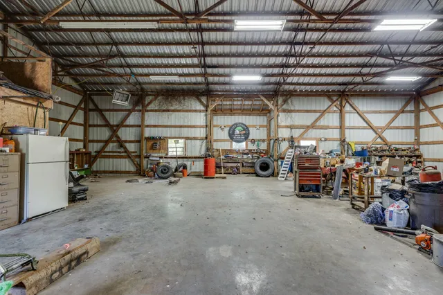 a view of a swimming pool with a yard