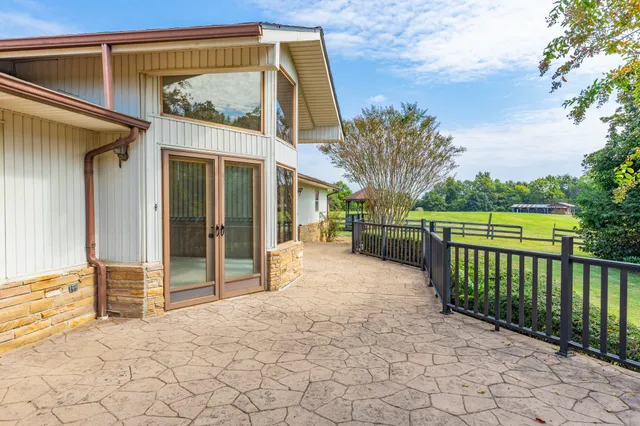 a view of an empty room with a balcony