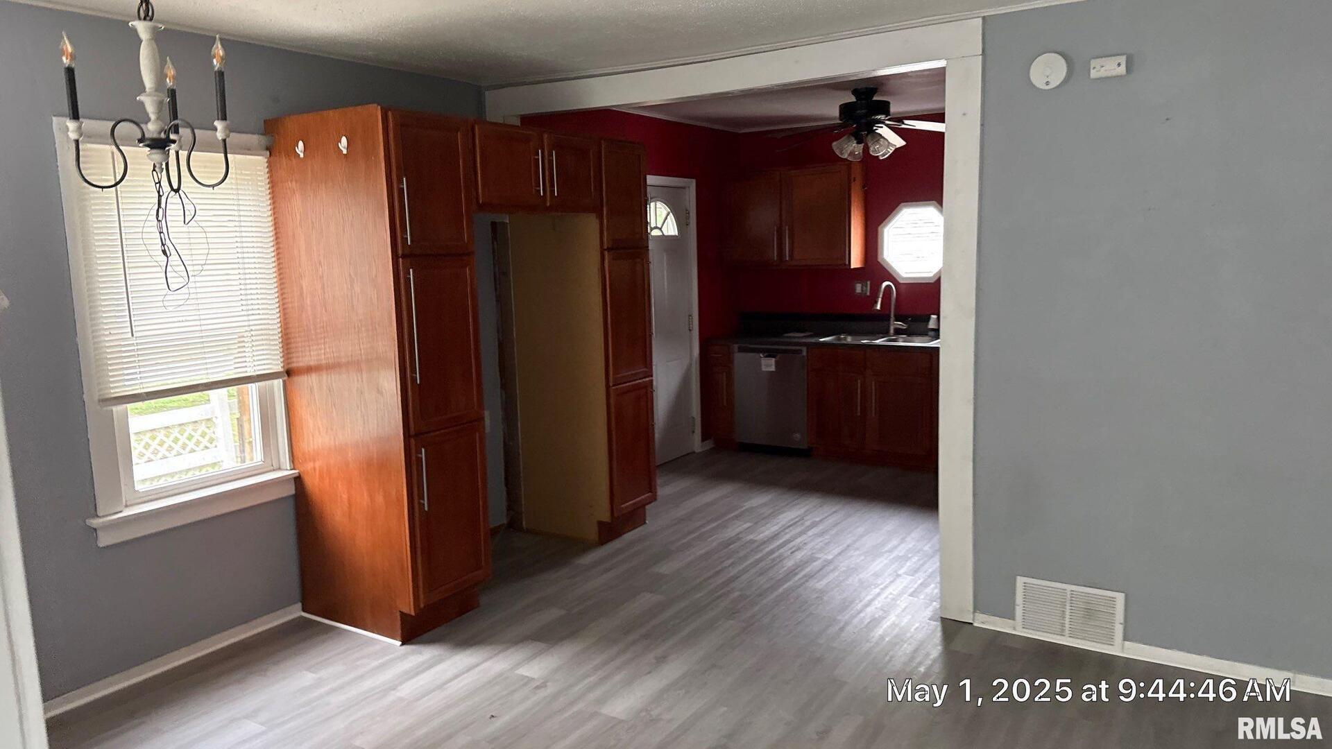818 9th Avenue Silvis, IL 61282 - Photo 2 of 10 a kitchen with stainless steel appliances granite countertop a refrigerator and a stove