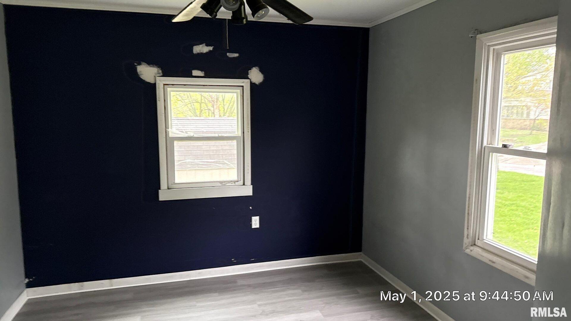 818 9th Avenue Silvis, IL 61282 - Photo 4 of 10 a view of an empty room with a window