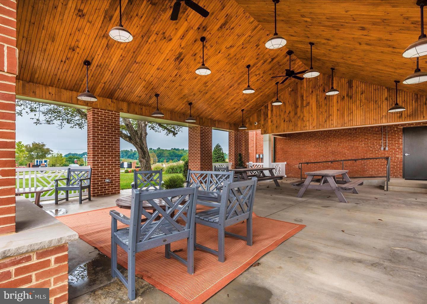 829 Holden Road Frederick, MD 21701 - Photo 53 of 57 a building outdoor space with patio furniture and garden view