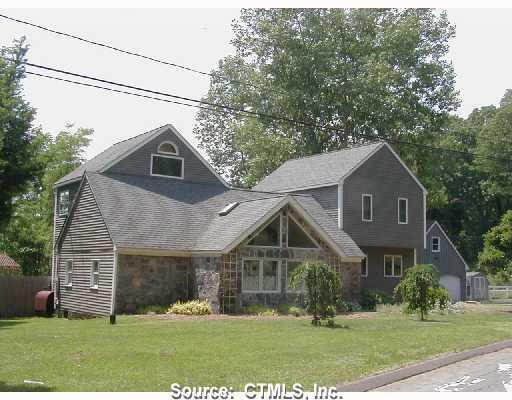 10 Dock Road Chester, CT 06412 - Photo 1 of 1 a front view of a house with a yard