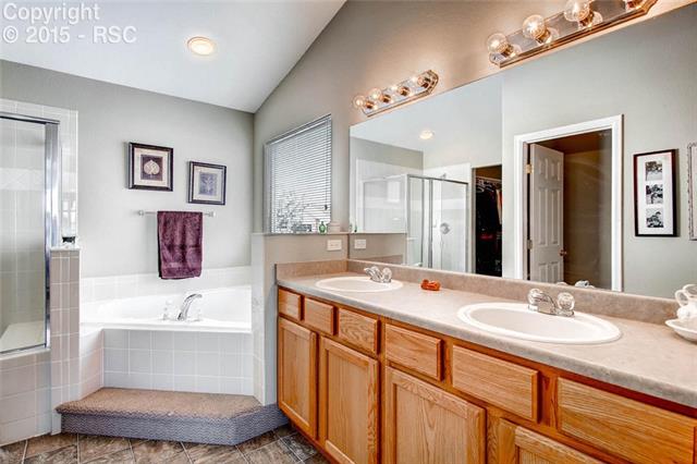 9425 Winged Foot Road Peyton, CO 80831 - Photo 13 of 28 5-Piece Master Bathroom.