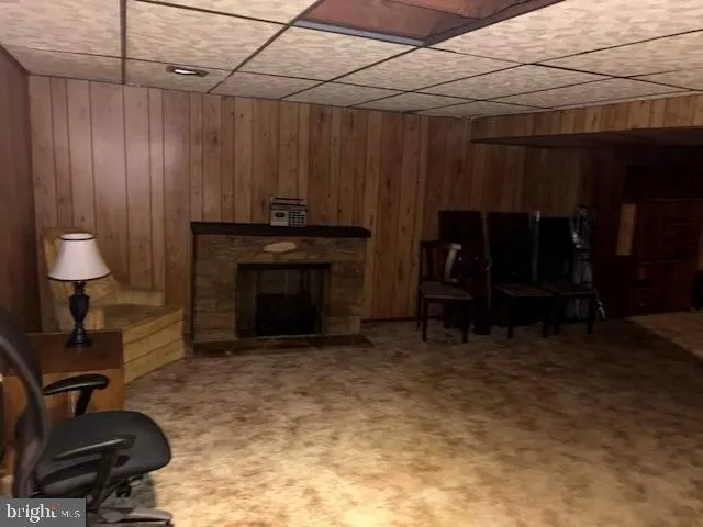 a view of a livingroom with furniture and a couch