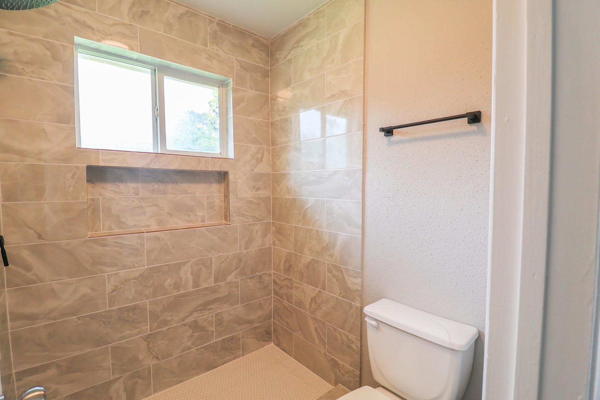 5027 Monteith Drive Spring, TX 77373 - Photo 17 of 28 a bathroom with a toilet and a shower