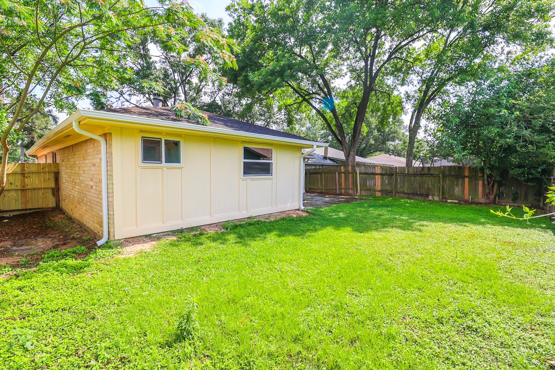 5027 Monteith Drive Spring, TX 77373 - Photo 22 of 28 a front view of a house with yard and green space