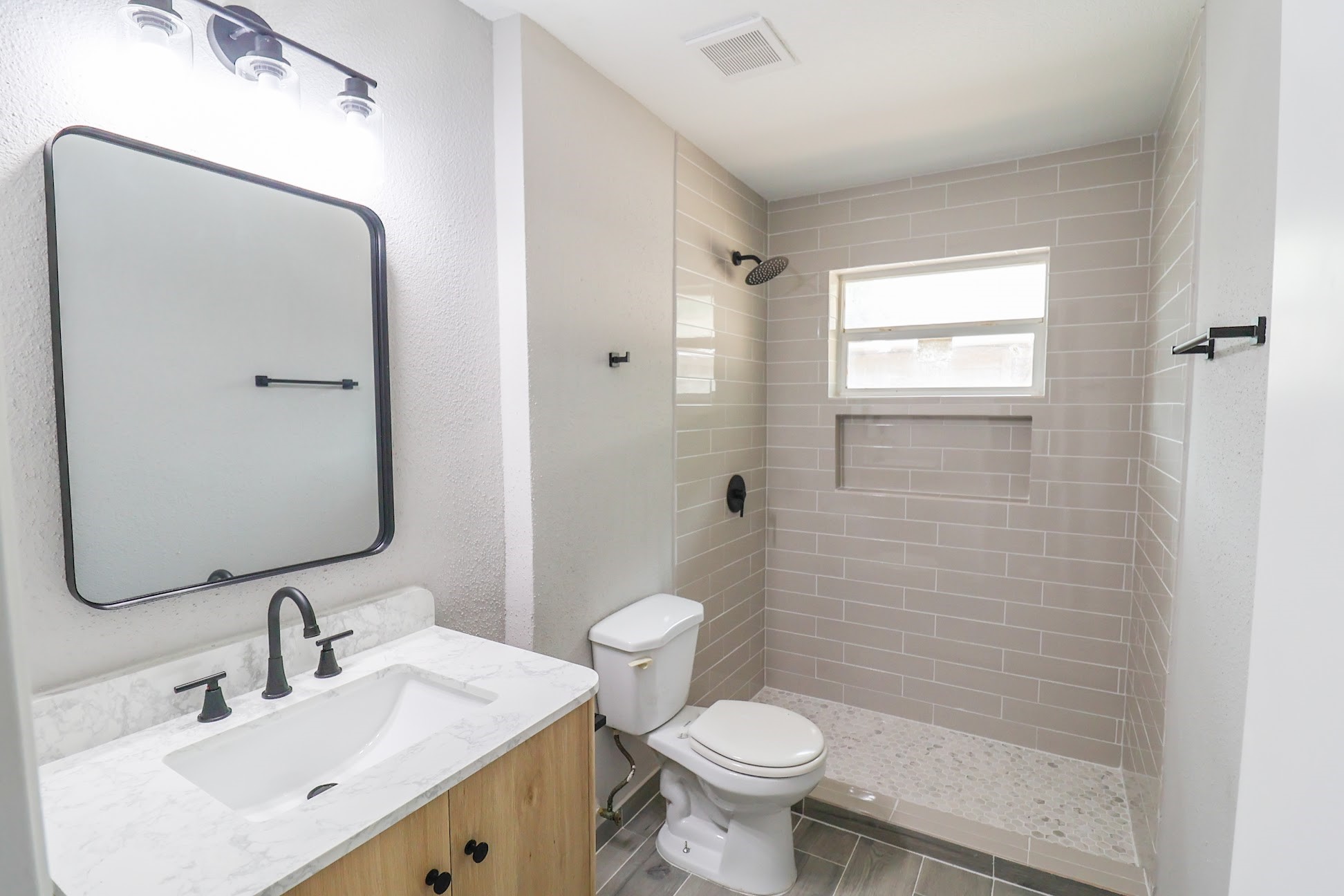 5027 Monteith Drive Spring, TX 77373 - Photo 6 of 28 a bathroom with a sink a toilet and shower