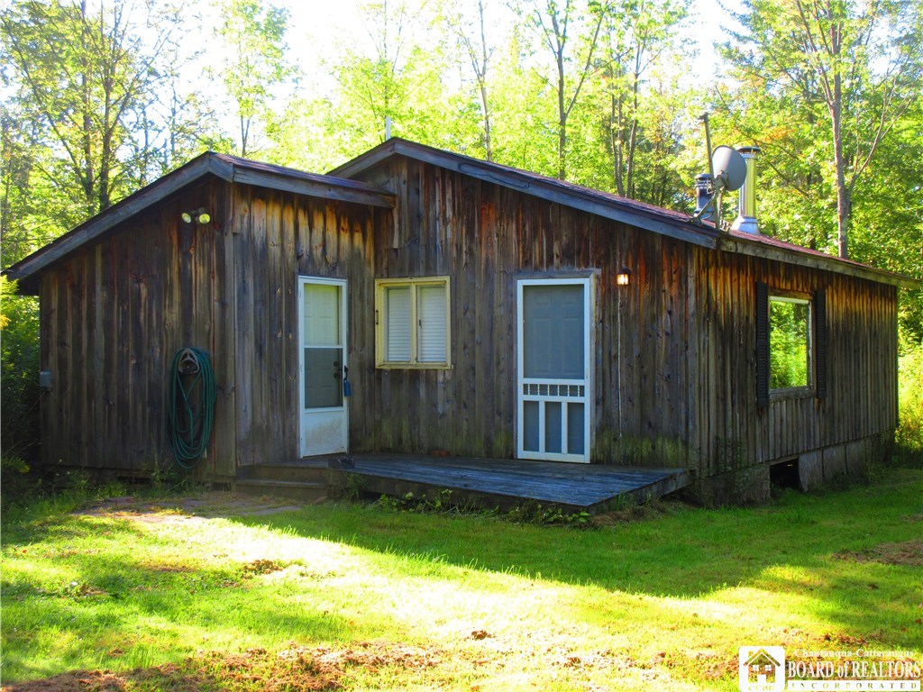 6629 Coe Road Stockton, NY 14784 - Photo 1 of 1 FRONT OF CABIN WITH PROPANE HEAT & WOOD STOVE