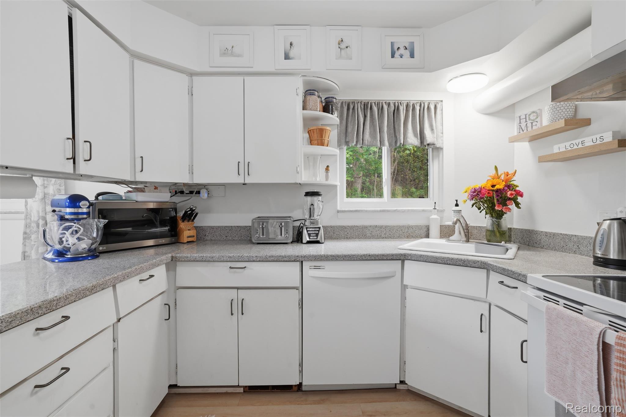 47129 Dunsany Road Northville, MI 48167 - Photo 15 of 49 Kitchen featuring open shelves, white cabinets, white appliances, and light countertops