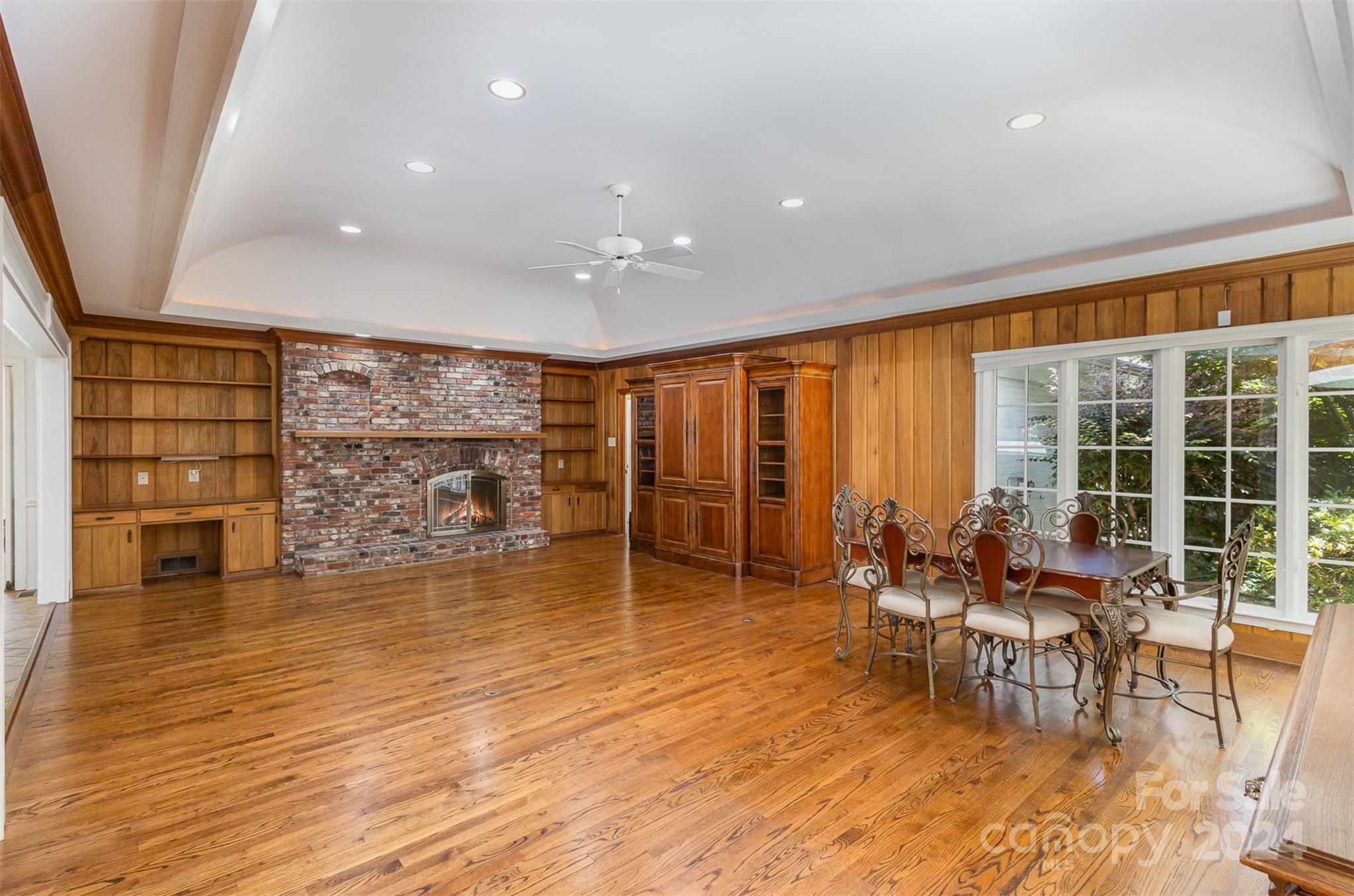 3524 Highview Road Charlotte, NC 28210 - Photo 11 of 34 an empty room with wooden floor and furniture