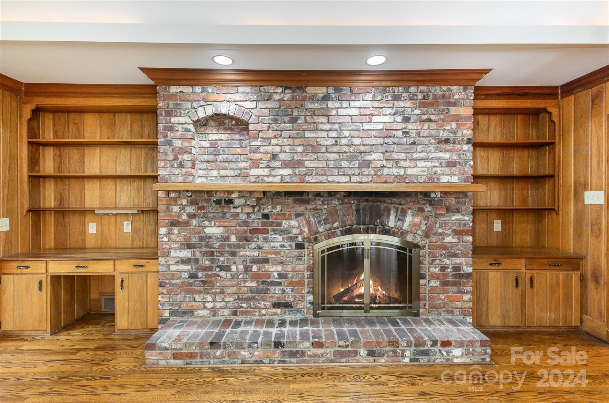 3524 Highview Road Charlotte, NC 28210 - Photo 14 of 34 a living room with a fireplace and a walk in closet