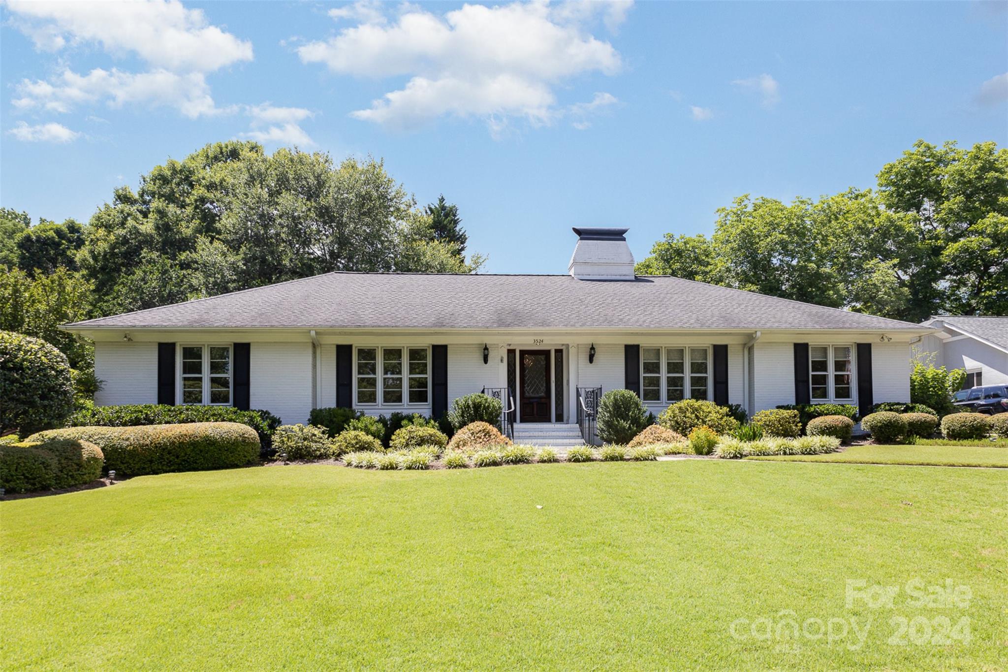 3524 Highview Road Charlotte, NC 28210 - Photo 2 of 34 a front view of a house with yard patio and green space