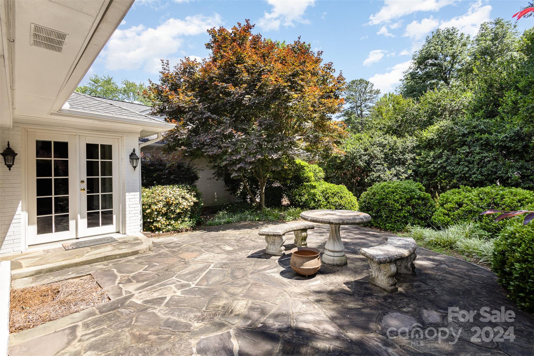 3524 Highview Road Charlotte, NC 28210 - Photo 30 of 34 a view of a chair and fire pit in backyard of the house