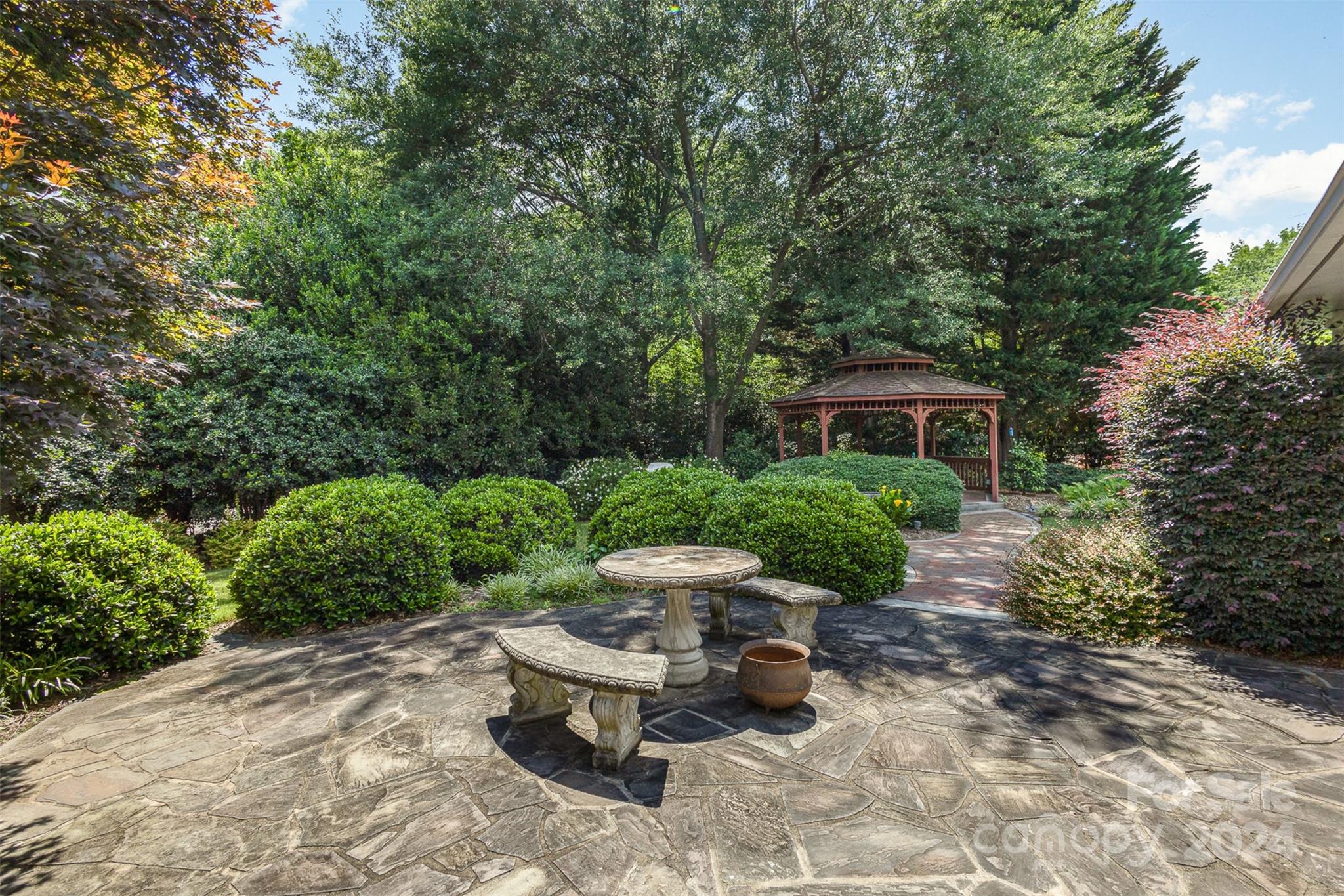 3524 Highview Road Charlotte, NC 28210 - Photo 34 of 34 a view of a backyard with furniture and plants