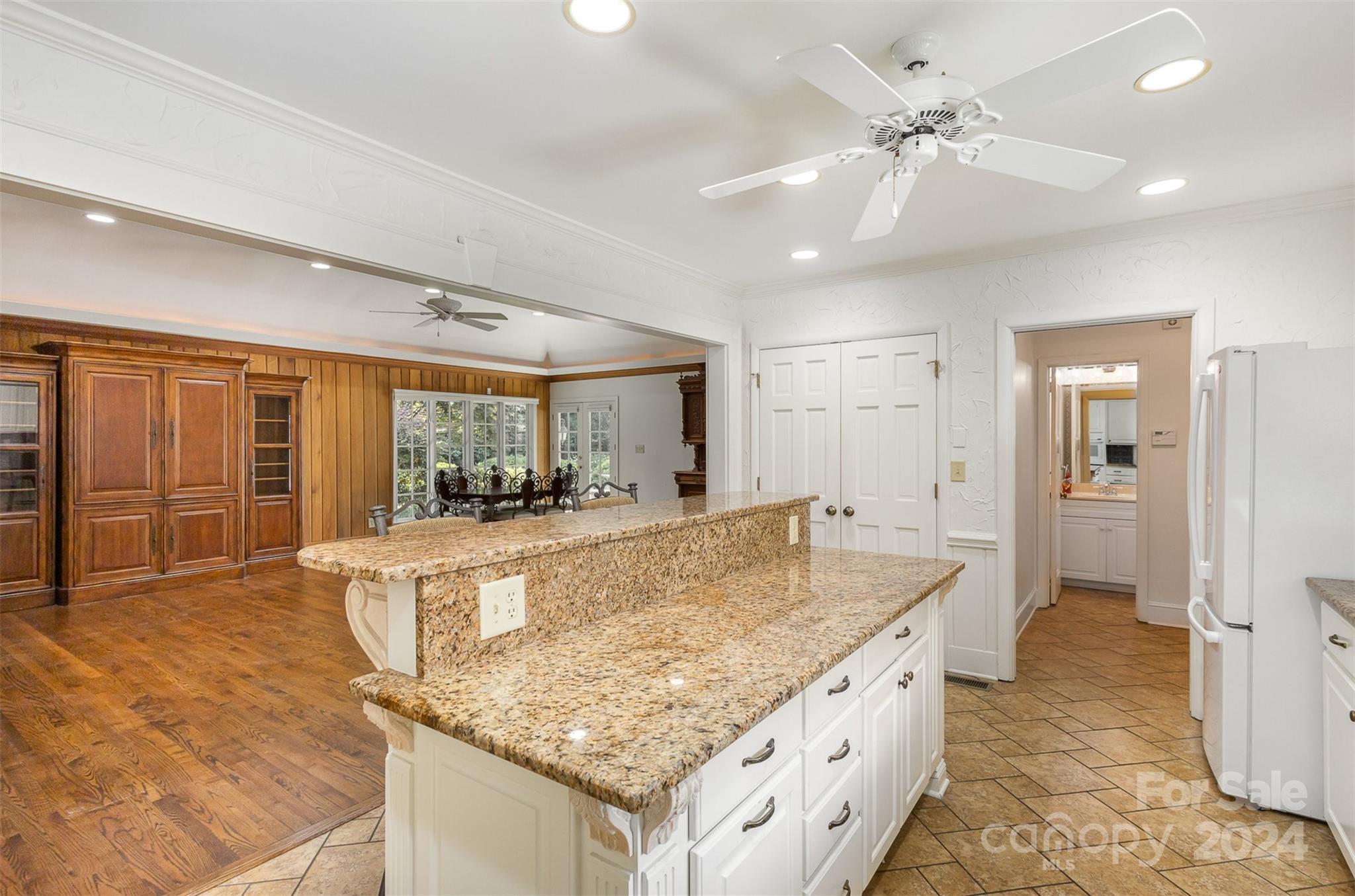 3524 Highview Road Charlotte, NC 28210 - Photo 7 of 34 a spacious bathroom with a granite countertop sink and a mirror