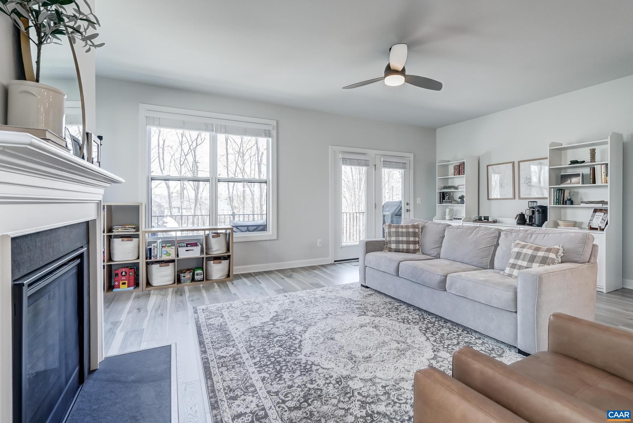 1816 Fowler Street Charlottesville, VA 22901 - Photo 15 of 51 a living room with furniture and a fireplace