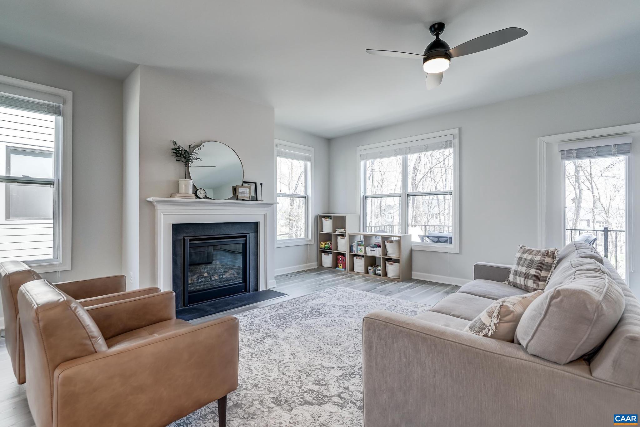 1816 Fowler Street Charlottesville, VA 22901 - Photo 16 of 51 a living room with furniture window and fireplace