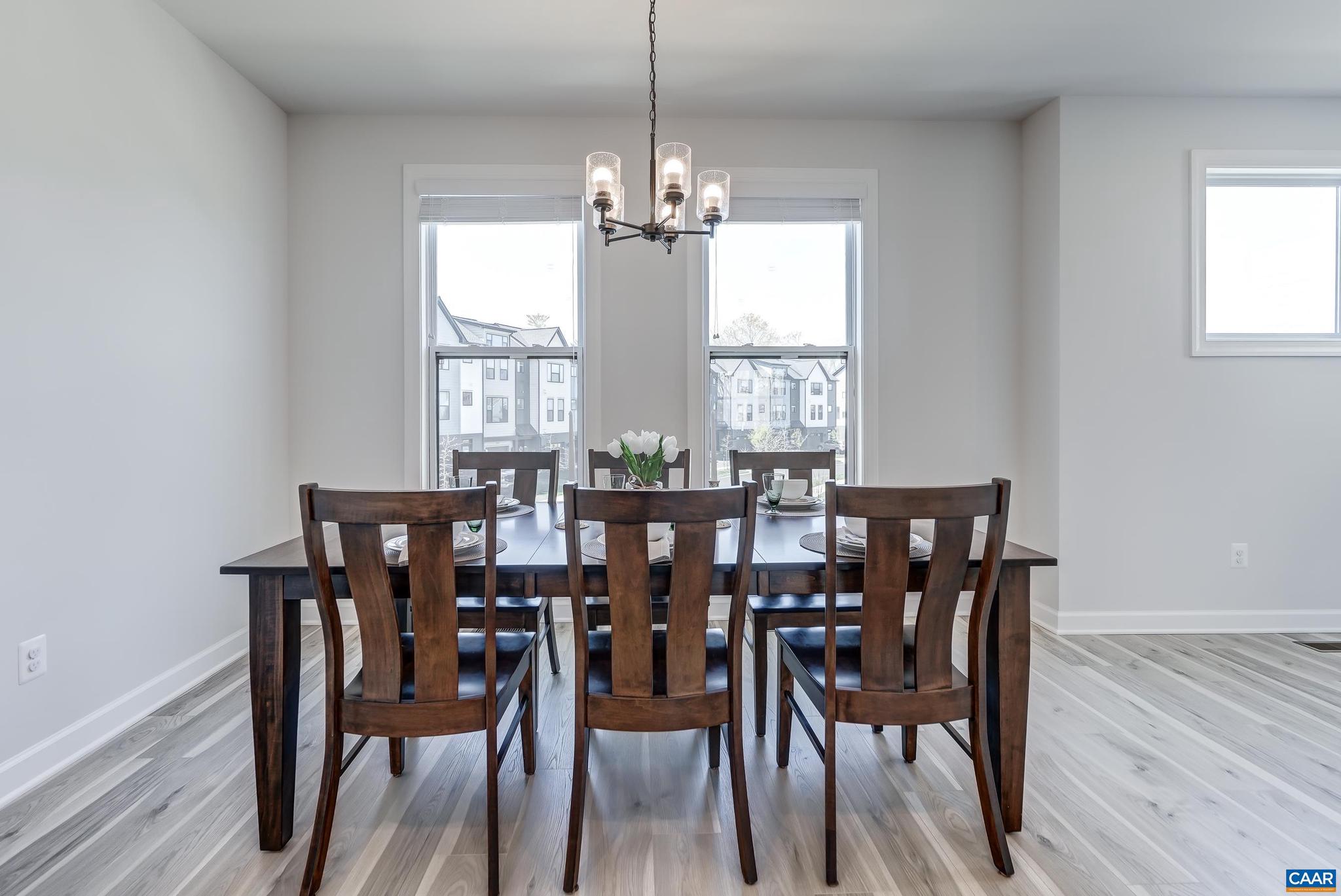 1816 Fowler Street Charlottesville, VA 22901 - Photo 19 of 51 a view of a dining room with furniture window and wooden floor