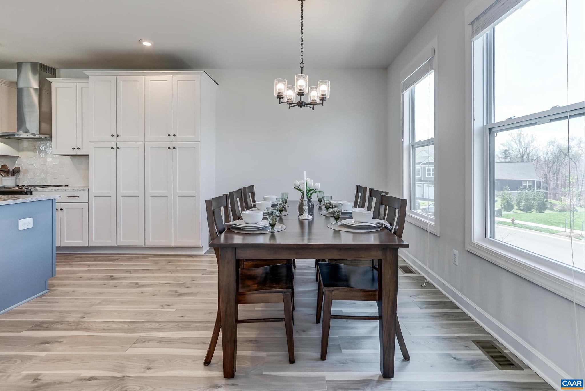 1816 Fowler Street Charlottesville, VA 22901 - Photo 20 of 51 a view of a dining room with furniture window and wooden floor