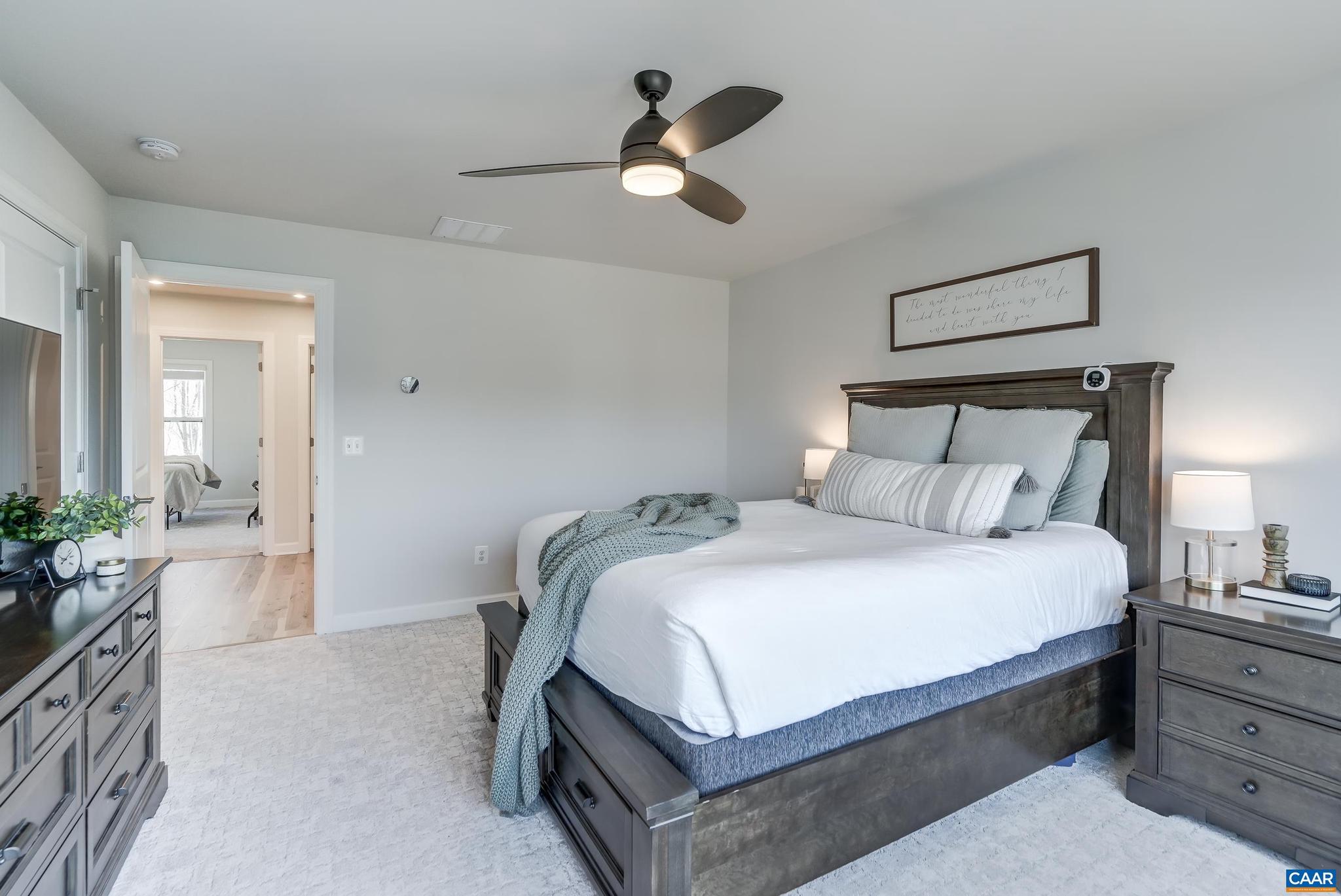 1816 Fowler Street Charlottesville, VA 22901 - Photo 23 of 51 a bed room with a bed and a ceiling fan