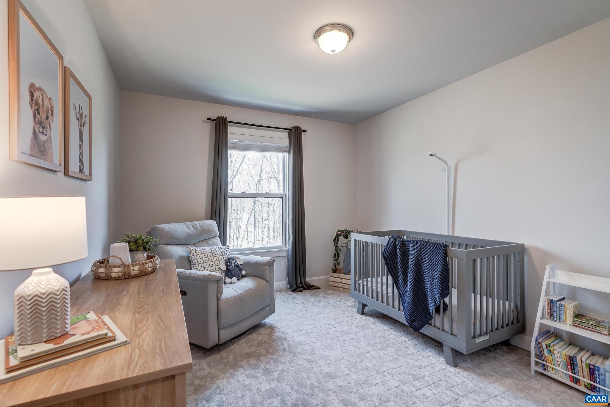 1816 Fowler Street Charlottesville, VA 22901 - Photo 26 of 51 a living room with furniture and a window