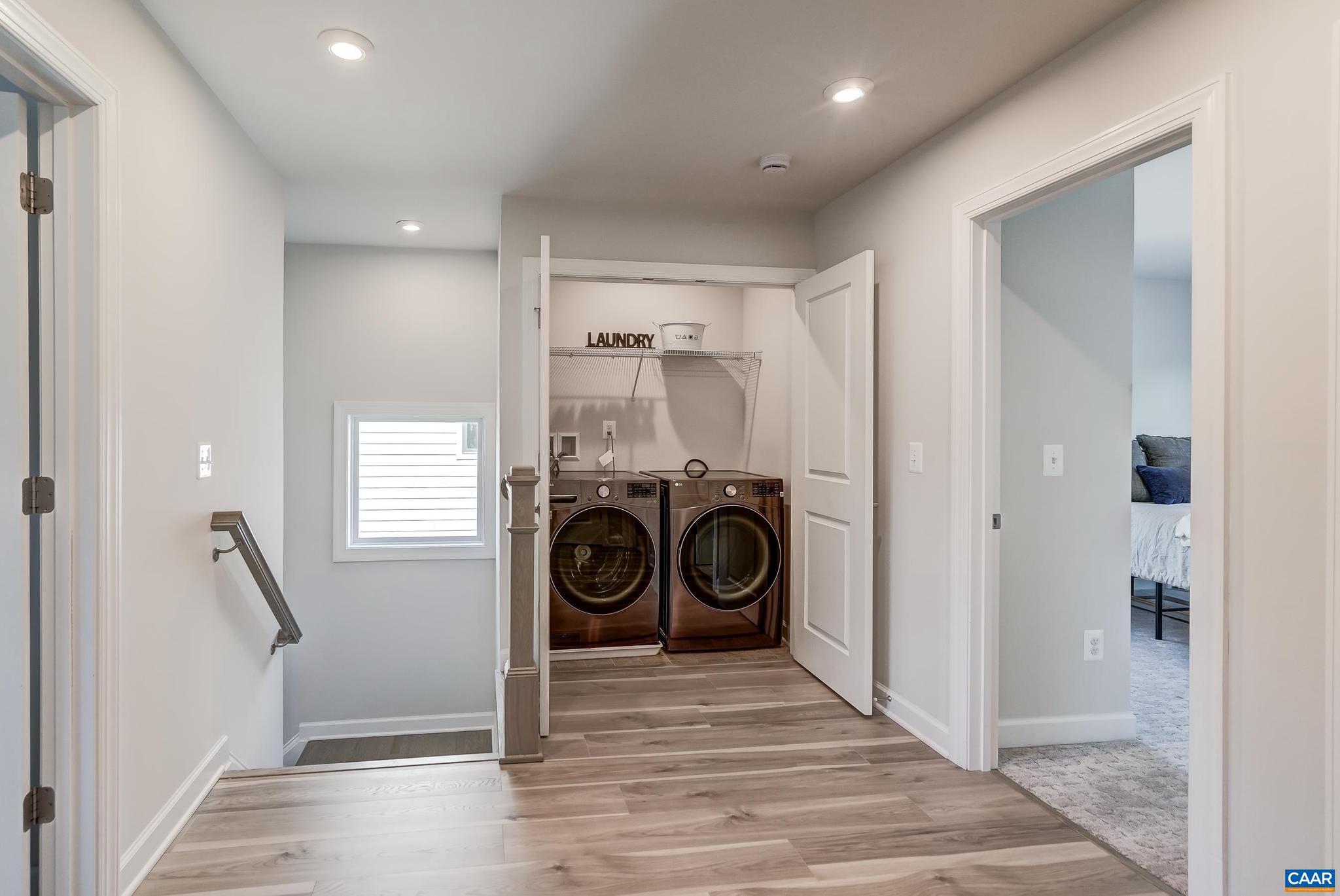 1816 Fowler Street Charlottesville, VA 22901 - Photo 30 of 51 a view of a hallway with washer and dryer