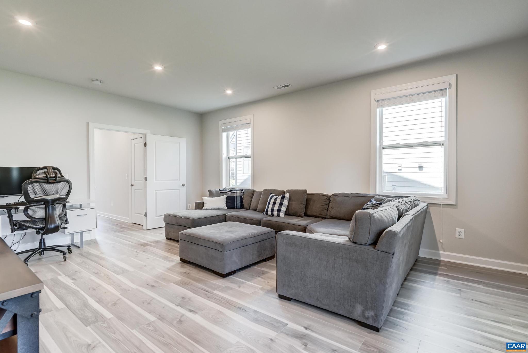 1816 Fowler Street Charlottesville, VA 22901 - Photo 33 of 51 a living room with furniture and a window