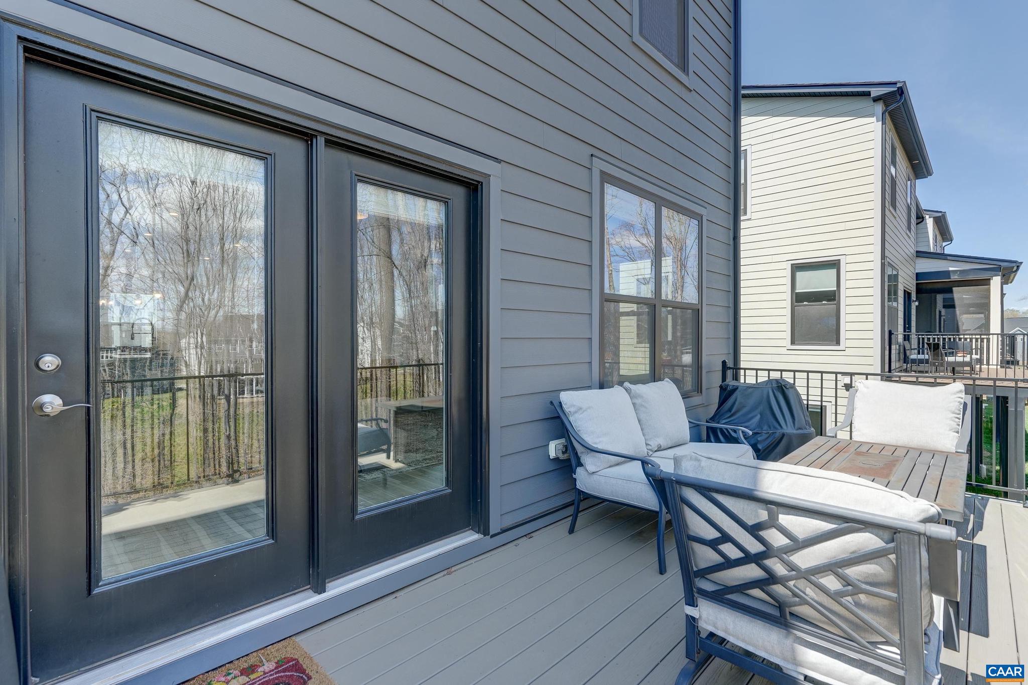 1816 Fowler Street Charlottesville, VA 22901 - Photo 38 of 51 a living room with furniture and a window