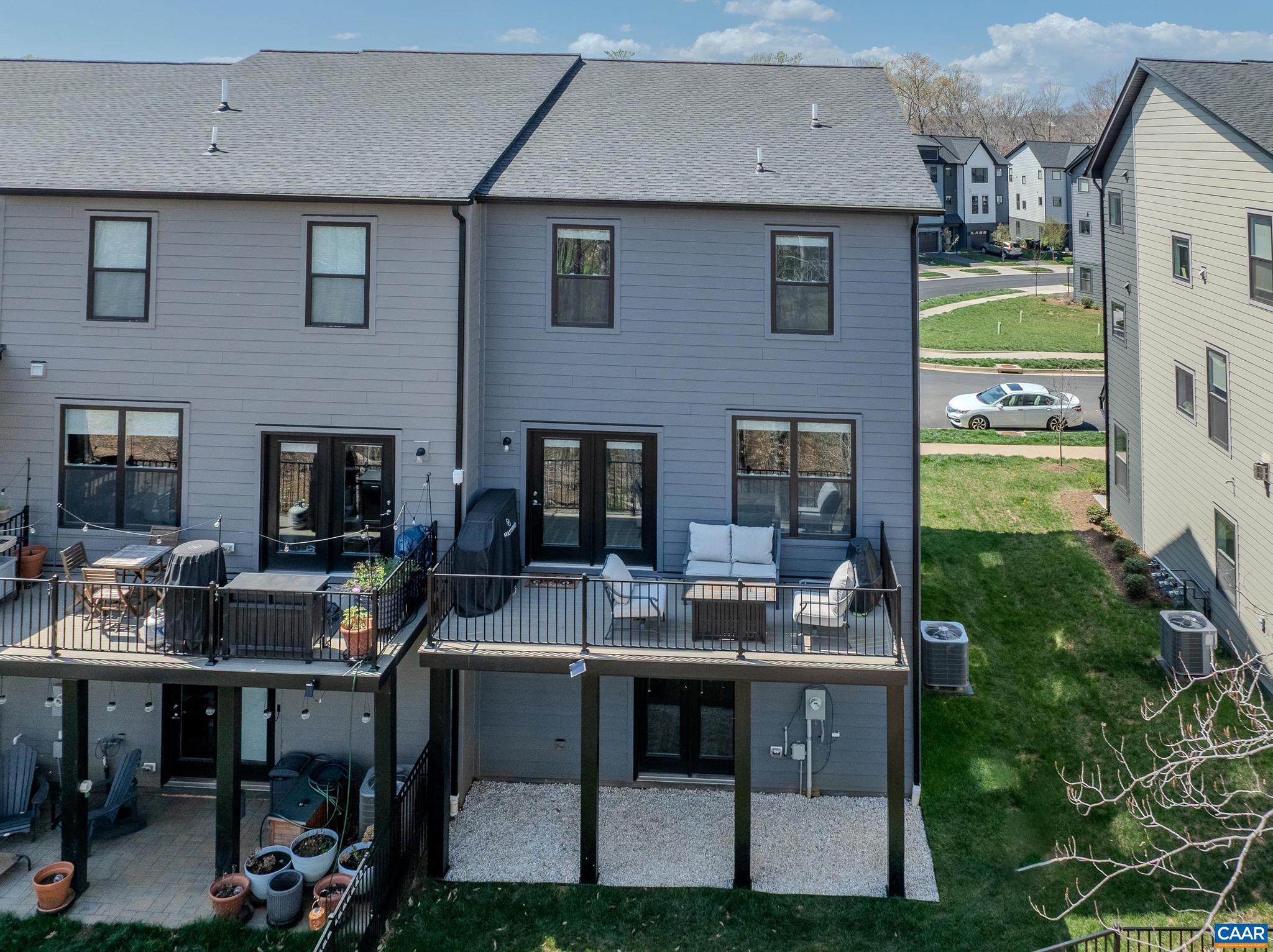 1816 Fowler Street Charlottesville, VA 22901 - Photo 41 of 51 a view of house and chair and tables in the patio