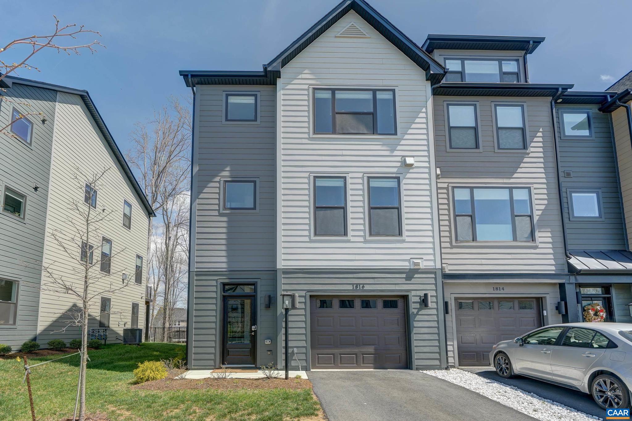 1816 Fowler Street Charlottesville, VA 22901 - Photo 44 of 51 a car parked in front of a brick house