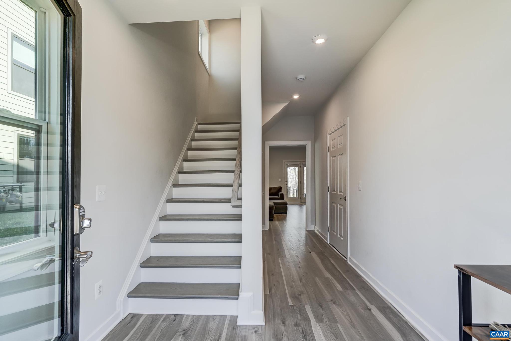1816 Fowler Street Charlottesville, VA 22901 - Photo 7 of 51 a view of a hallway with wooden floor and entryway