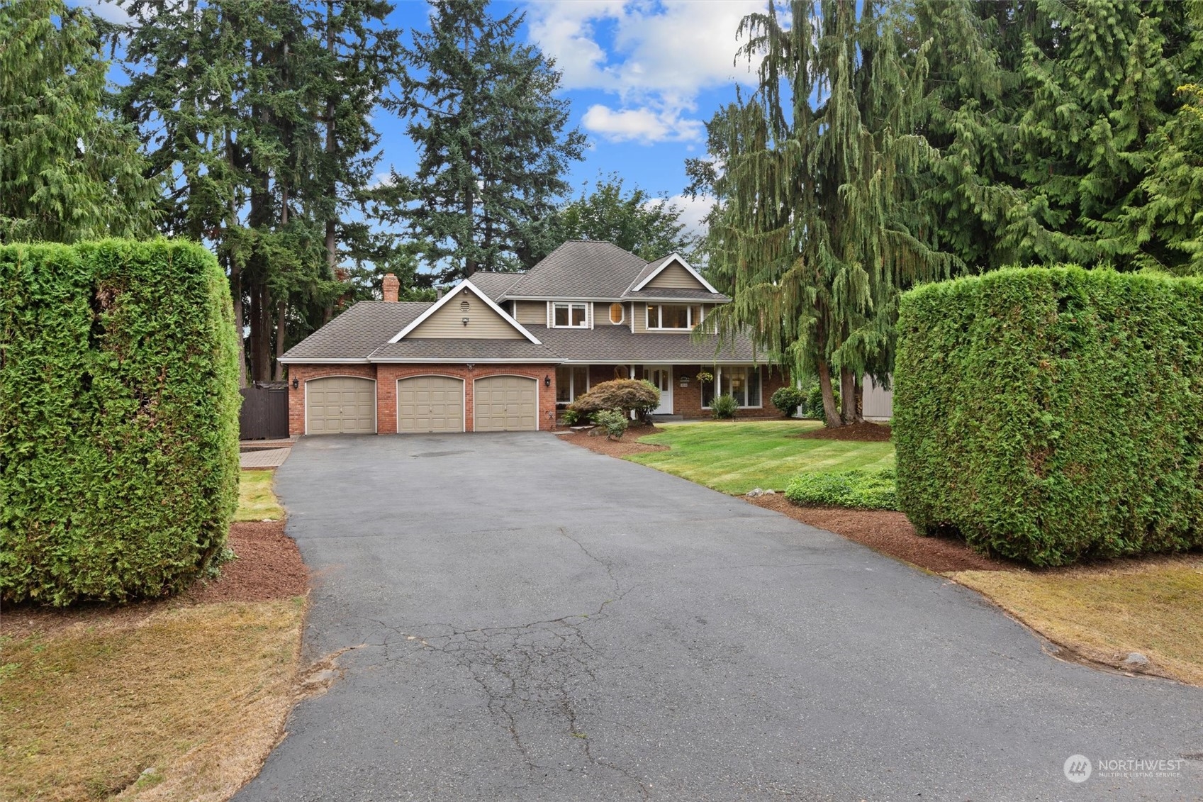 3014 184th Place Southeast Bothell, WA 98012 - Photo 2 of 36 a view of a house with a yard and potted plants