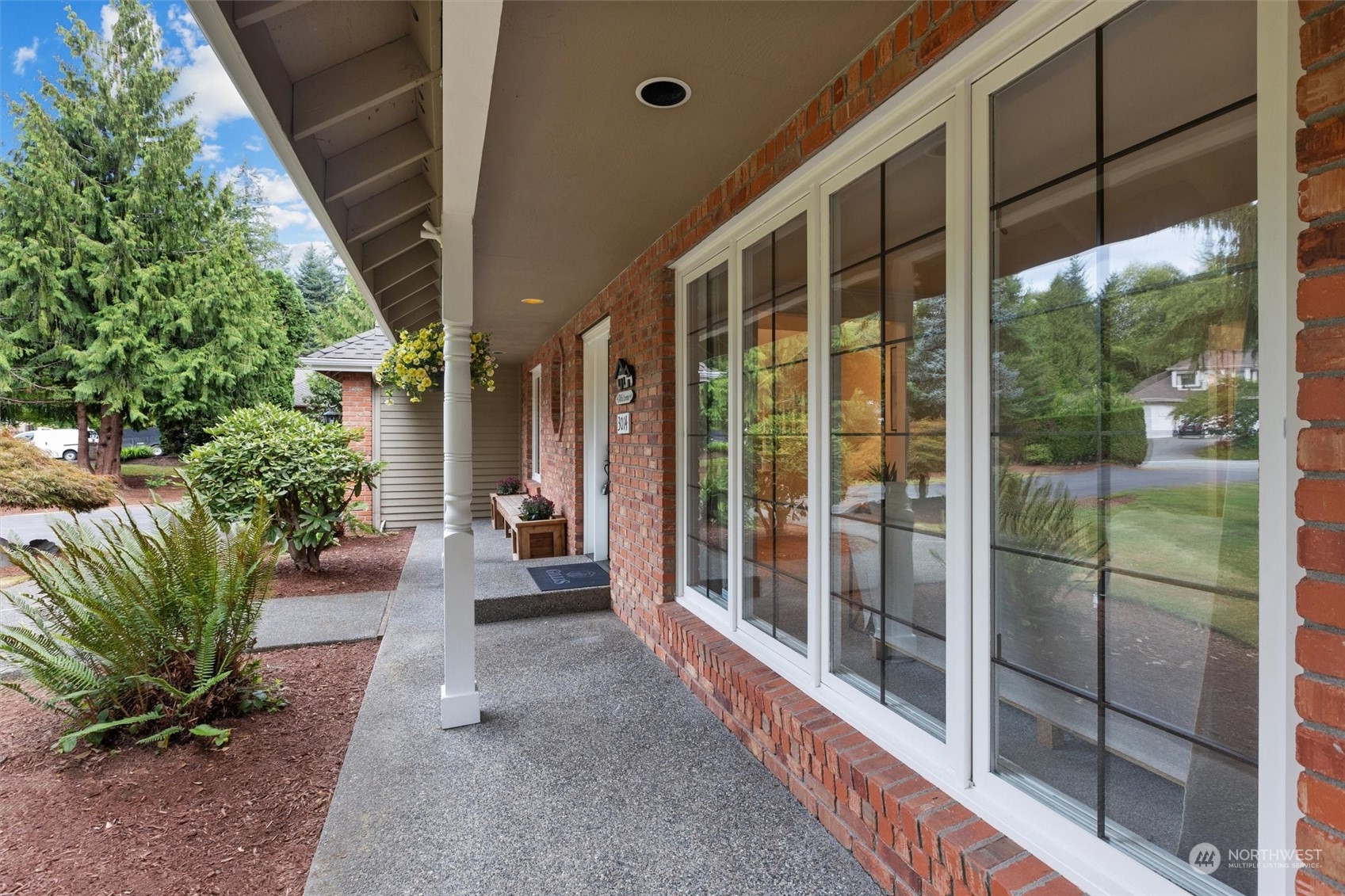 3014 184th Place Southeast Bothell, WA 98012 - Photo 5 of 36 a view of a house with a garden