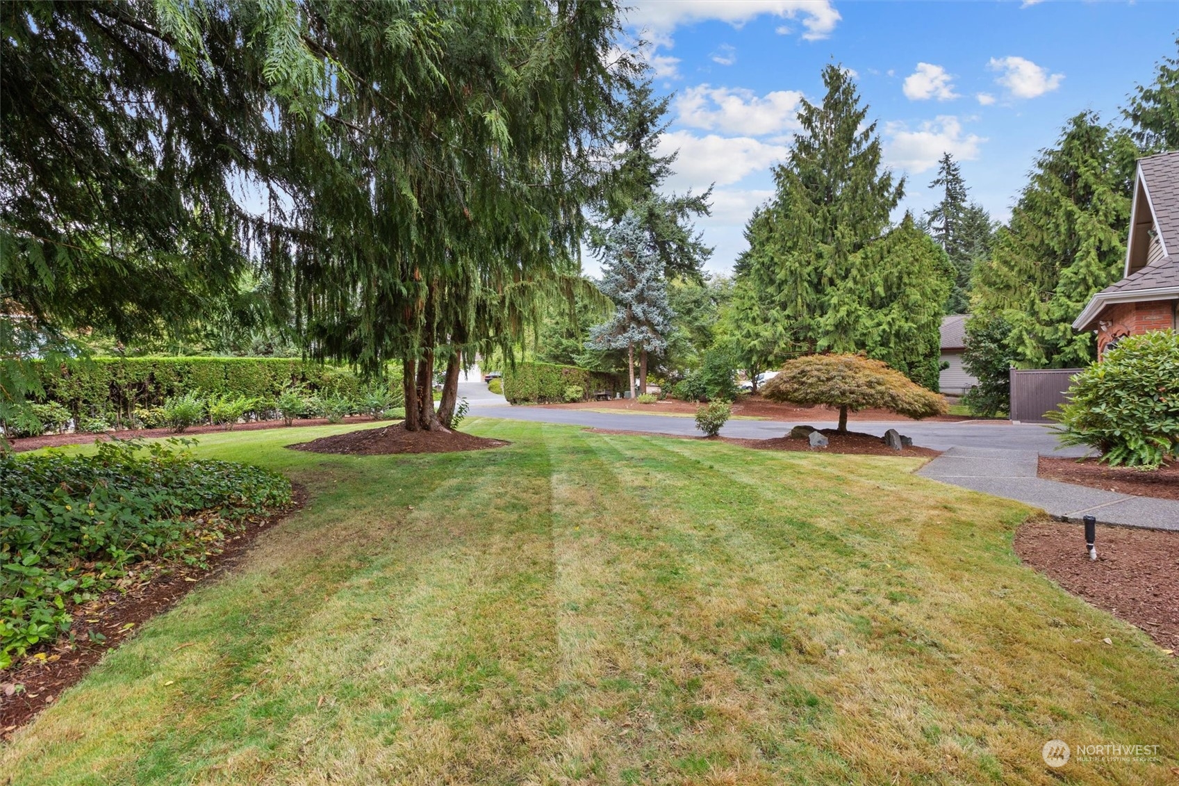3014 184th Place Southeast Bothell, WA 98012 - Photo 6 of 36 a view of outdoor space with deck and garden