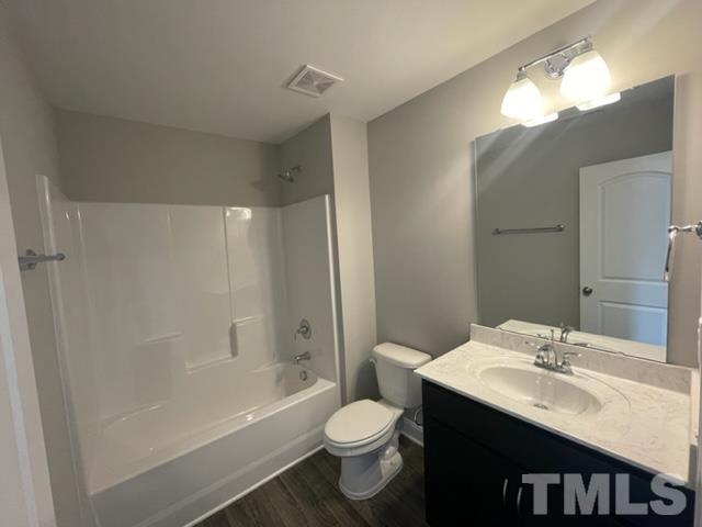 24 Star Valley Dr. Valley Angier, NC 27501 - Photo 8 of 23 a bathroom with a sink a toilet and shower