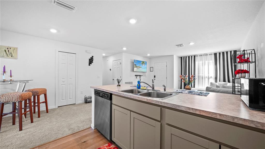 1477 Winthrop Street North Port, FL 34288 - Photo 12 of 100 a kitchen with sink and view of living room