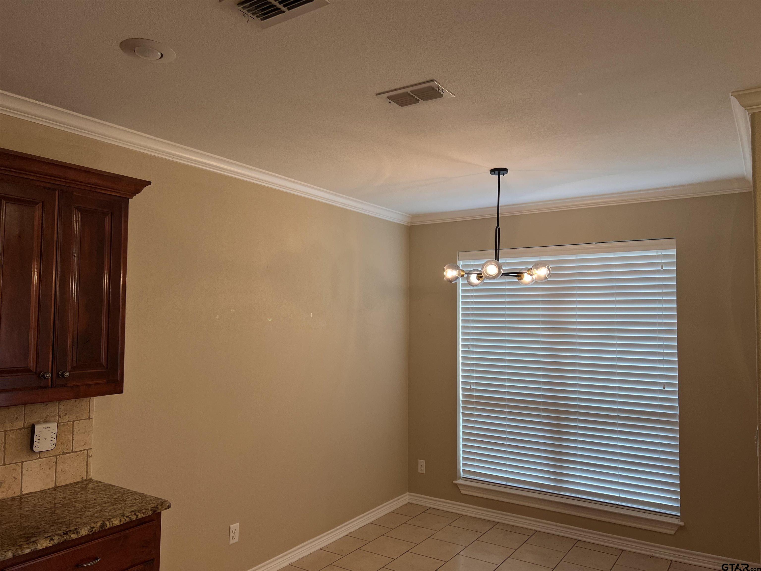 112 Letha Court Tyler, TX 75702 - Photo 27 of 45 a view of a kitchen with a window hardwood and furniture