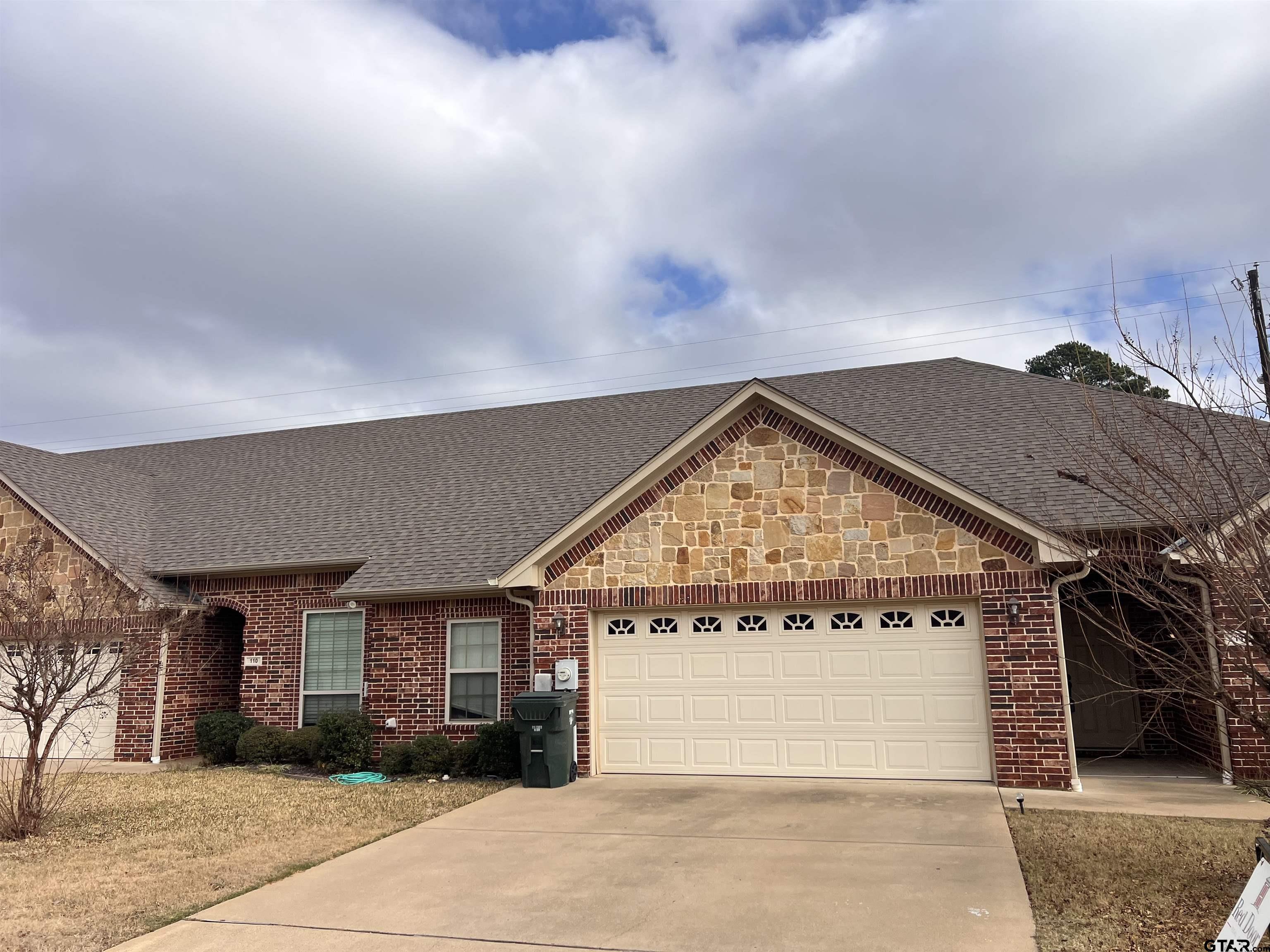 112 Letha Court Tyler, TX 75702 - Photo 34 of 45 a view of a house with a garage