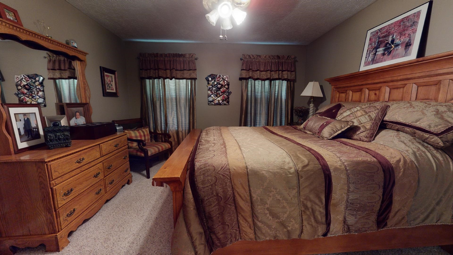 50 Bobby Thompson Road Newbern, TN 38059 - Photo 15 of 26 a bedroom with a bed and a closet