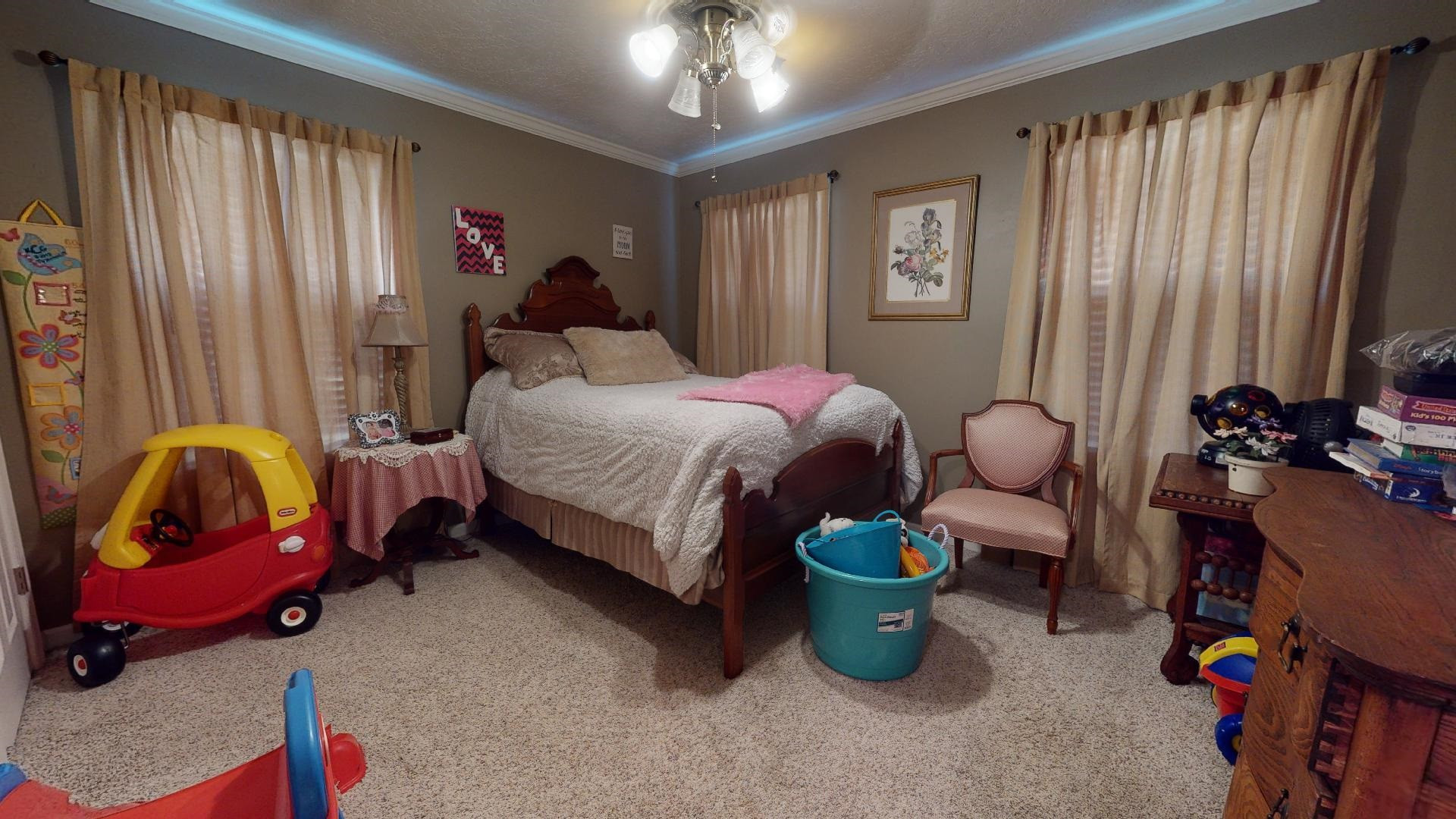 50 Bobby Thompson Road Newbern, TN 38059 - Photo 16 of 26 a bedroom with bed and a window